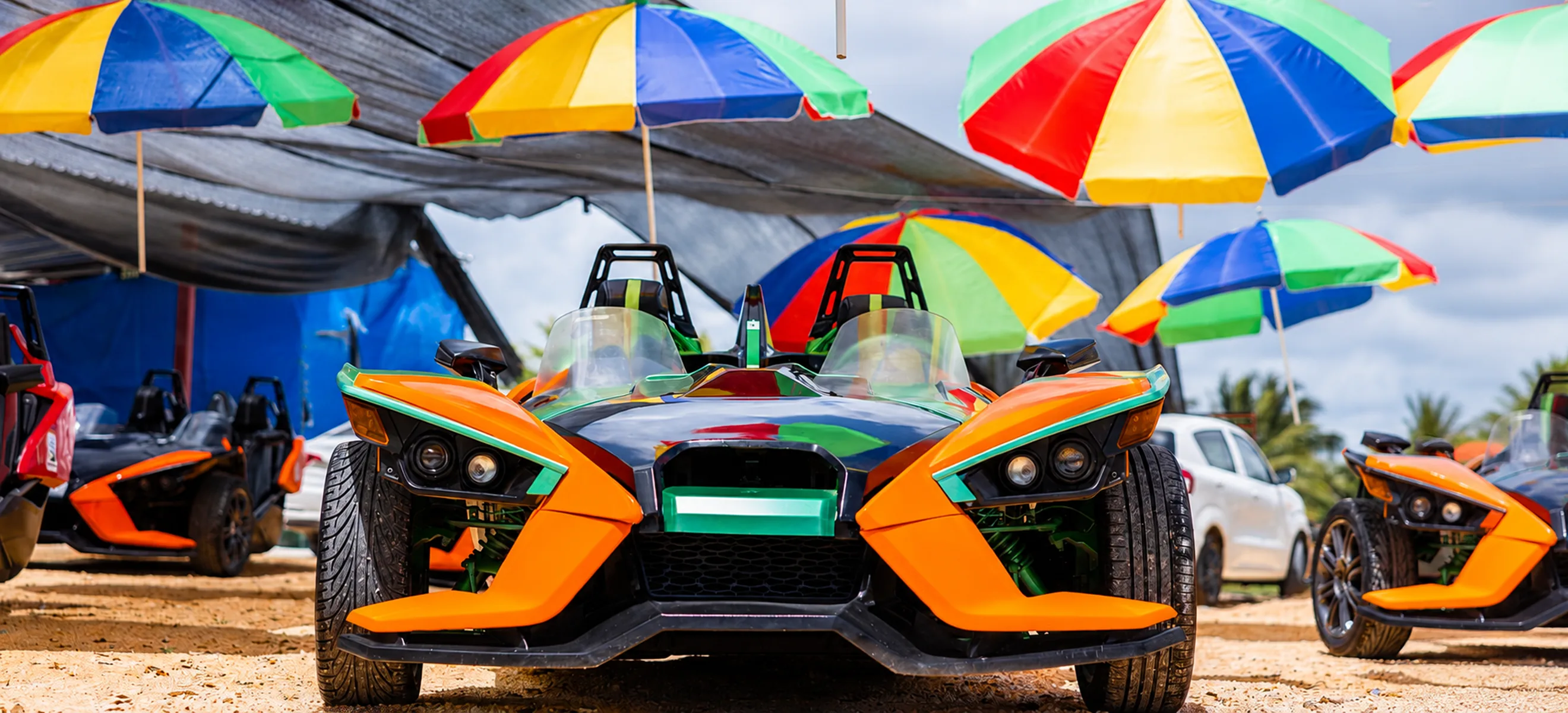 Polaris Slingshot vehicles at the Macao Slingshot HUB before a guided tour through Nisibón back roads and Macao Beach in Punta Cana.
