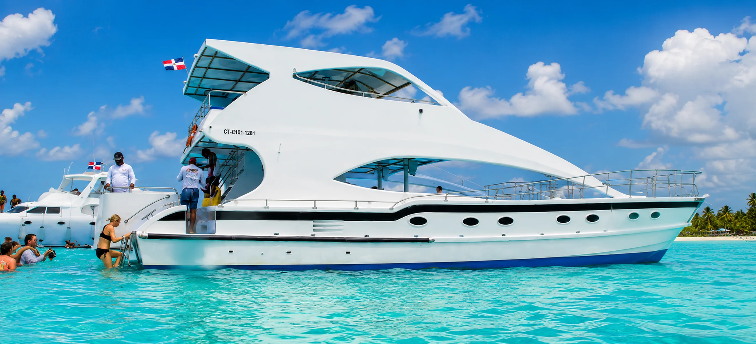 Private luxury catamaran charter on the turquoise waters of Saona Island in the Dominican Republic.