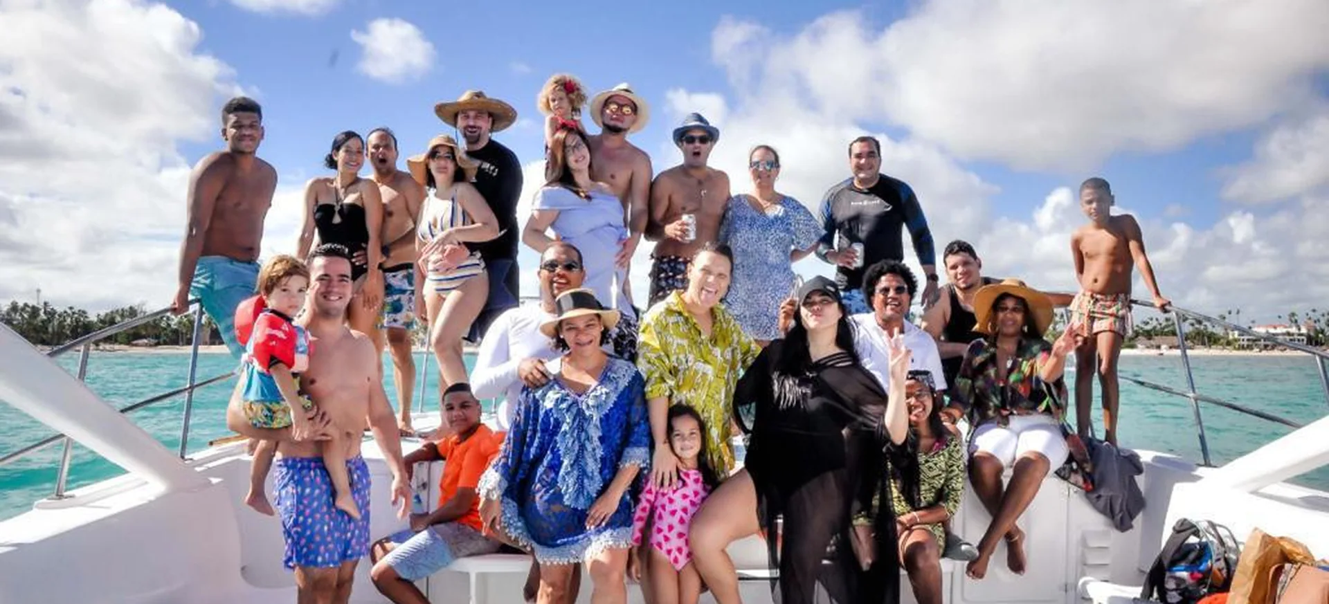 Private group posing on deck during Vibra Party Boat charter in Punta Cana