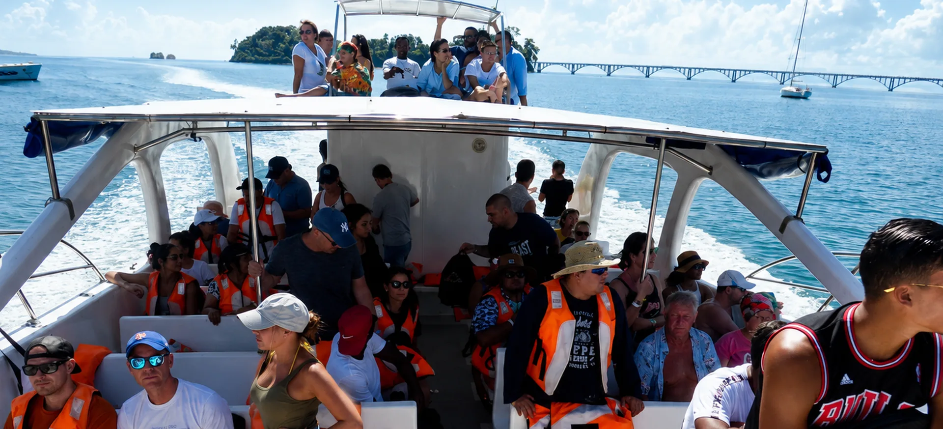 Guests aboard a whale watching excursion boat in Samaná Bay