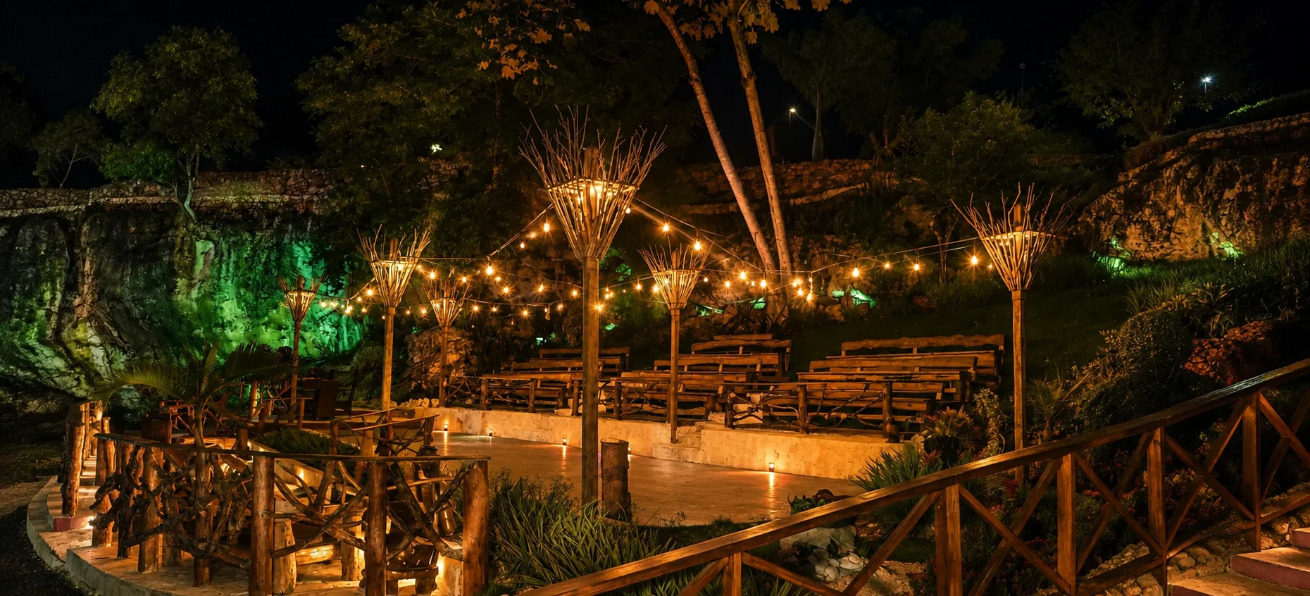 Outdoor nighttime cultural show amphitheater at Domitai Park in Punta Cana.