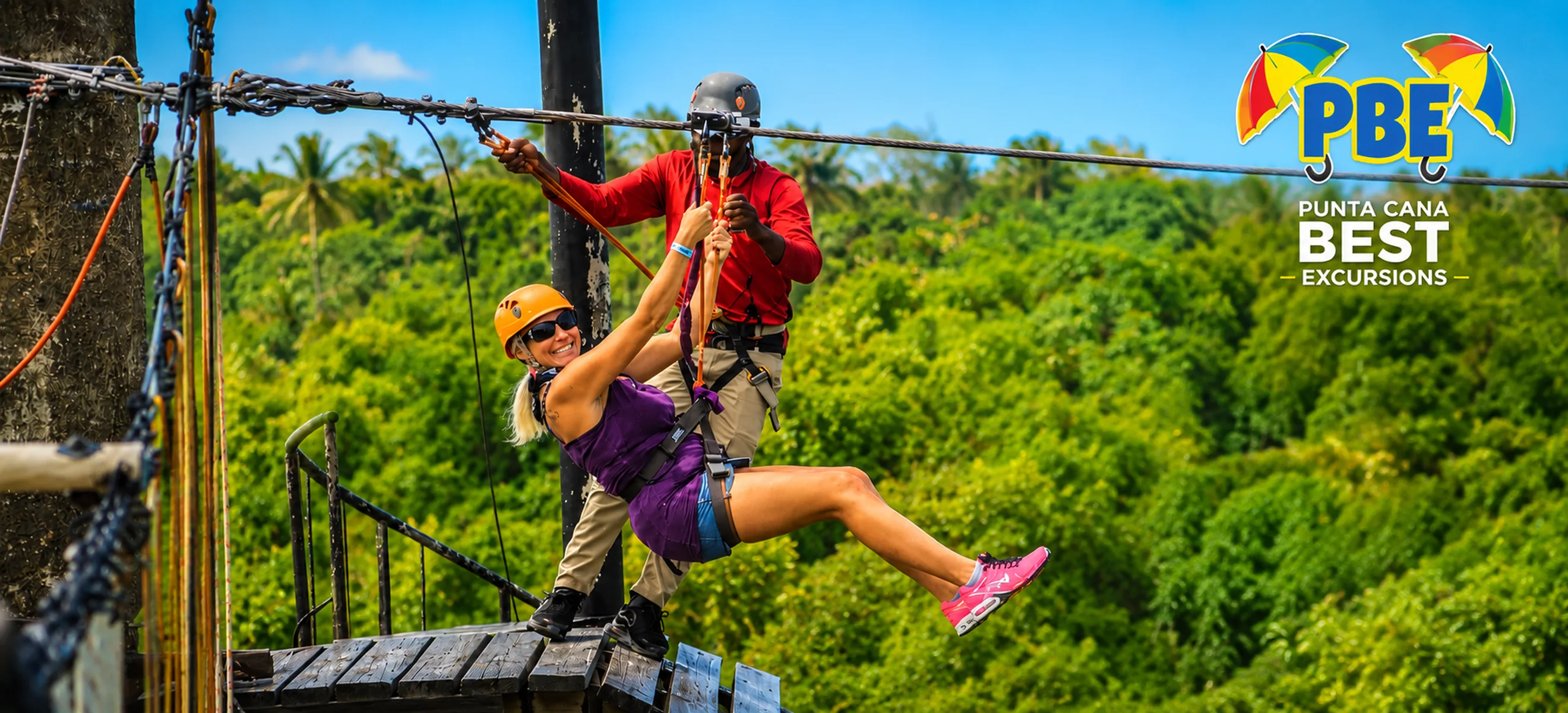 Woman enjoying the zipline at Bávaro Adventure Park in Punta Cana.