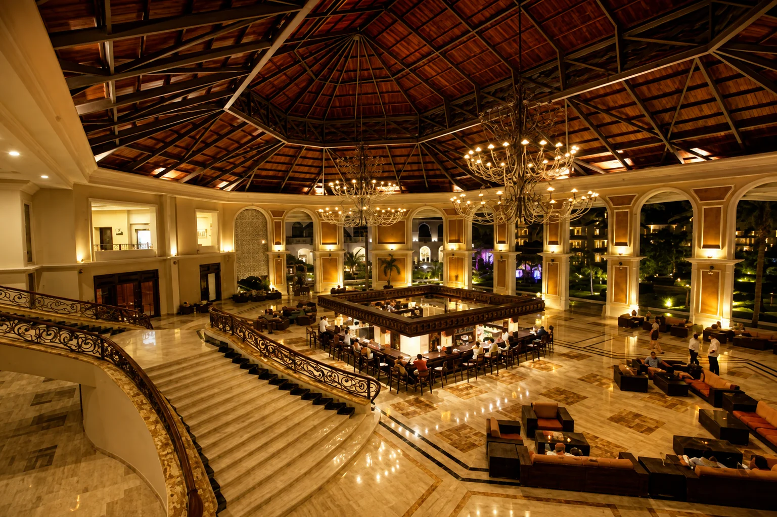Majestic Elegance Punta Cana grand lobby with chandeliers and elegant staircase