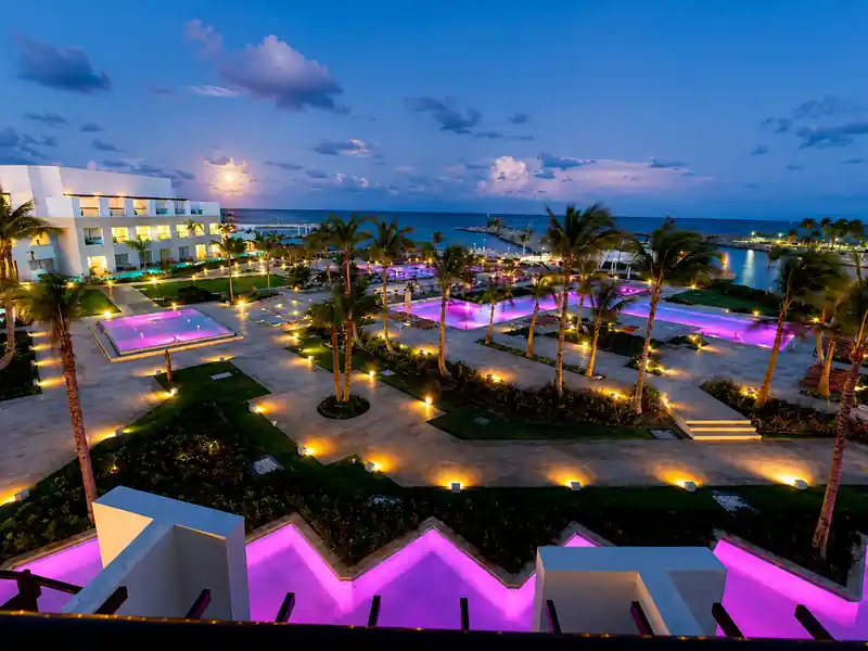 Luxury Punta Cana hotel and marina illuminated at night