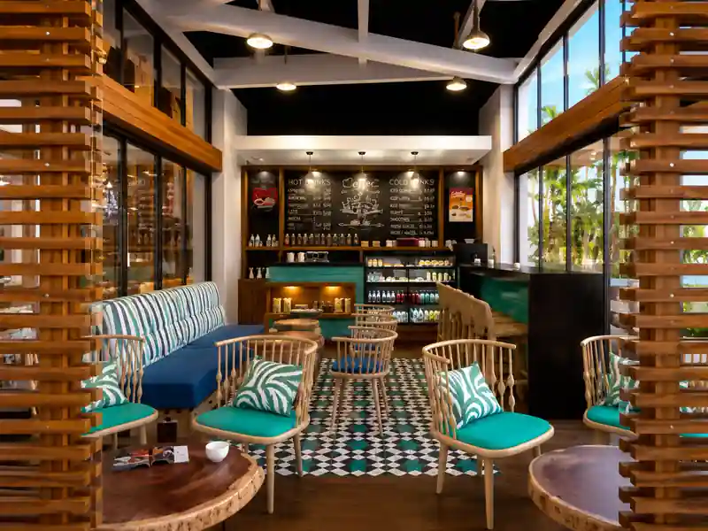 Tropical resort café in Punta Cana with modern seating and coffee bar