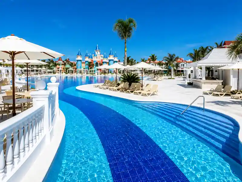 Nickelodeon Punta Cana resort swimming pool with castle and tropical surroundings