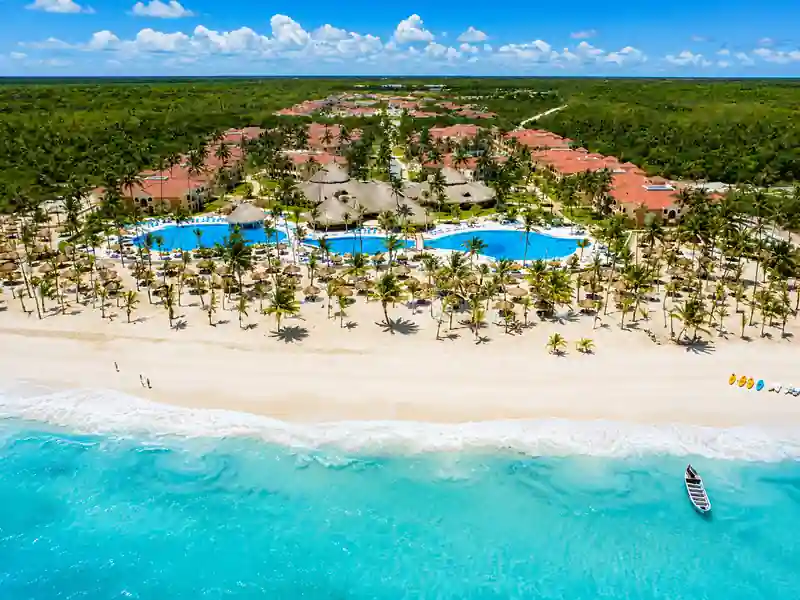Aerial view of Bahia Principe Grand Aquamarine Punta Cana beachfront resort and pools