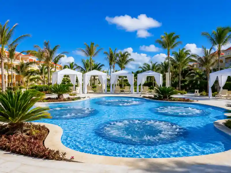 Bahia Principe Grand Aquamarine Punta Cana relaxation pool with private cabanas and tropical gardens