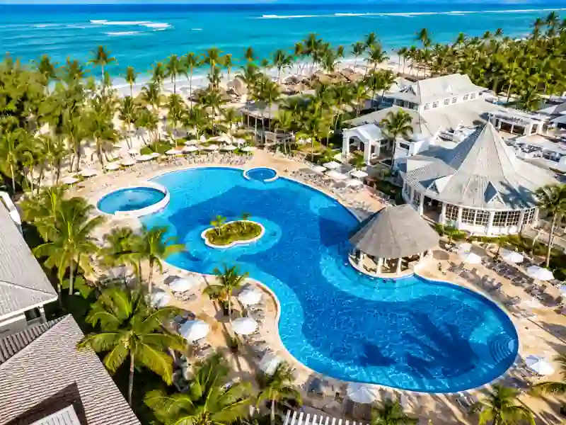 Aerial view of Bahia Principe Luxury Esmeralda pool and beachfront resort in Punta Cana