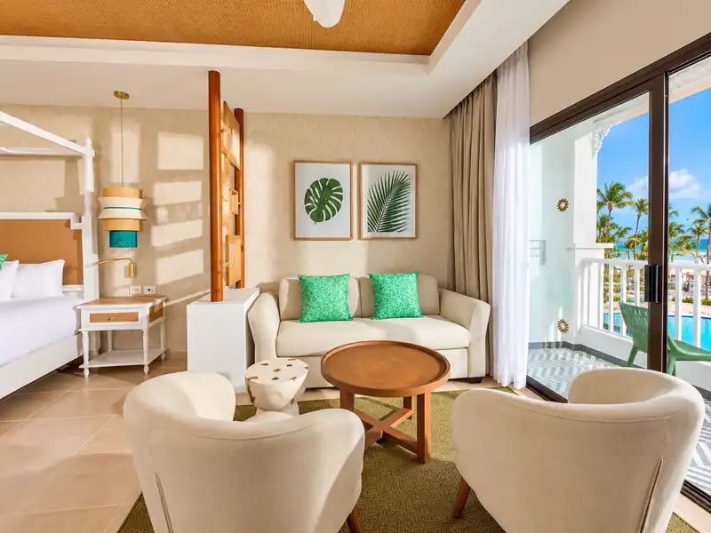 Bahia Principe Luxury Esmeralda Junior Suite with balcony and tropical pool view in Punta Cana