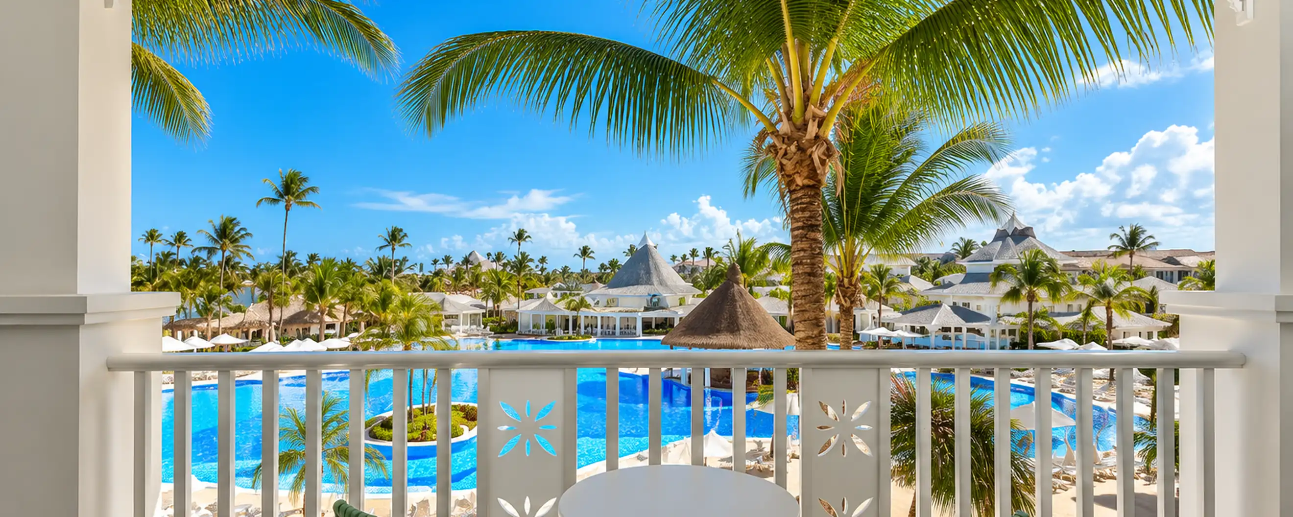 Bahia Principe Luxury Esmeralda balcony overlooking the tropical resort pool in Punta Cana