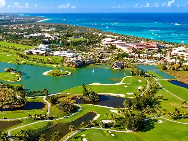 Aerial view of Barceló Bávaro Palace golf course, resort and Caribbean coastline in Punta Cana