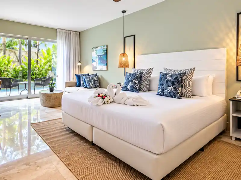 Luxury Punta Cana resort room with tropical garden view and modern Caribbean decor