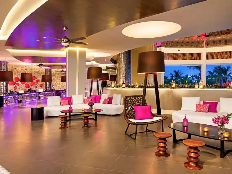 Luxury Punta Cana resort lounge and bar with modern tropical decor
