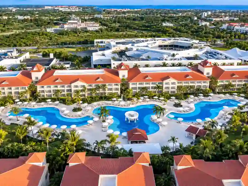 Aerial view of Bahia Principe Ambar resort swimming pools and tropical grounds in Punta Cana