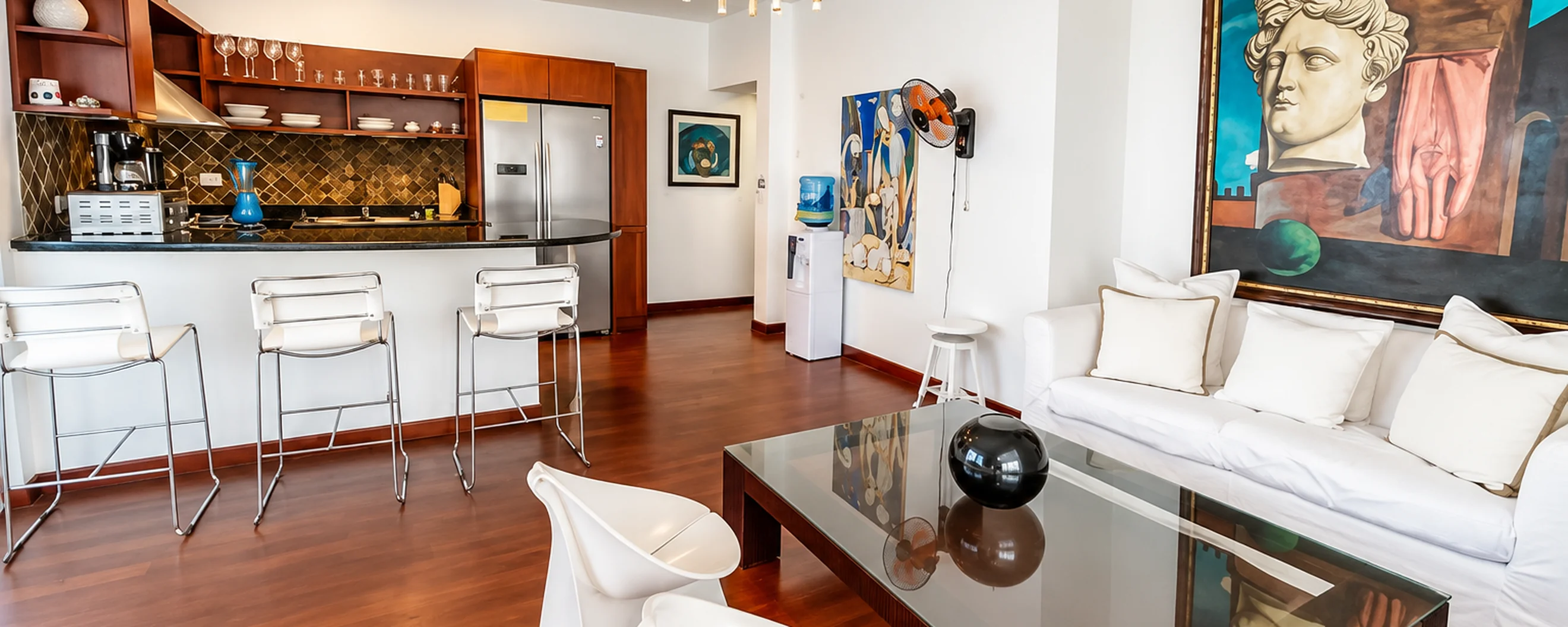 Luxury Punta Cana condo living room and modern kitchen interior