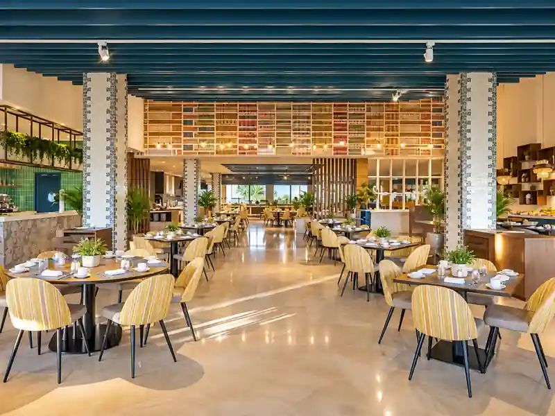 Catalonia Royal Bavaro resort restaurant with modern dining area and tropical Caribbean design.