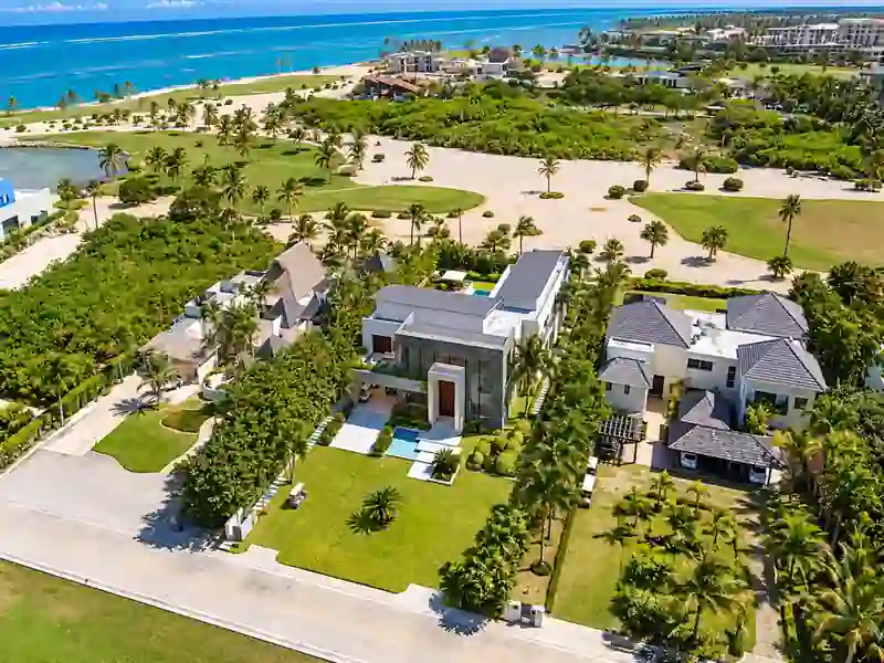 Cayuco 10 Cap Cana luxury villa aerial view overlooking the golf course and Caribbean coastline.