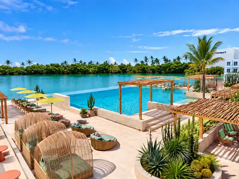 Club Med Punta Cana pool and tropical outdoor lounge area