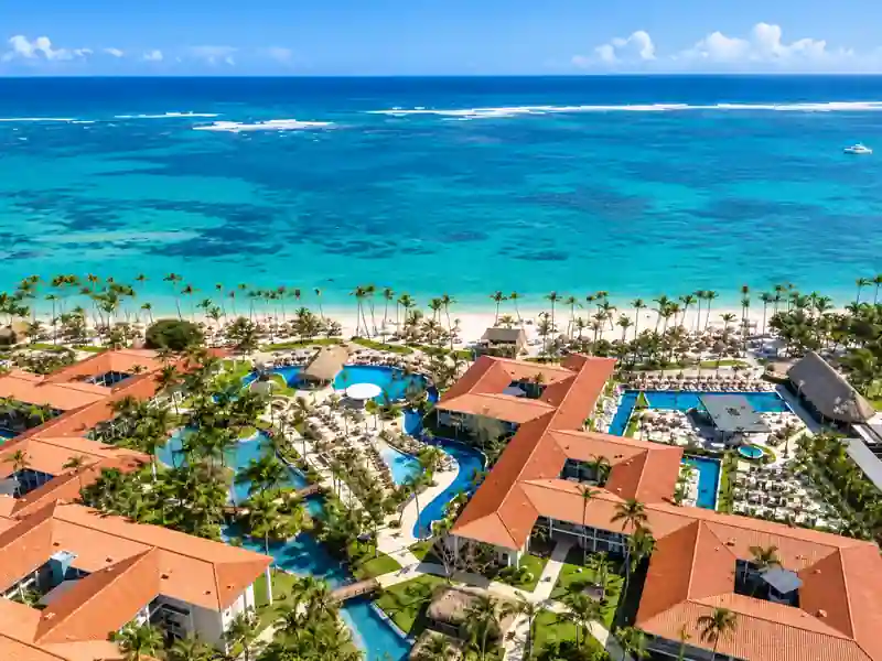 Aerial view of Dreams Flora Cabeza de Toro beachfront resort with tropical pools and Caribbean Sea