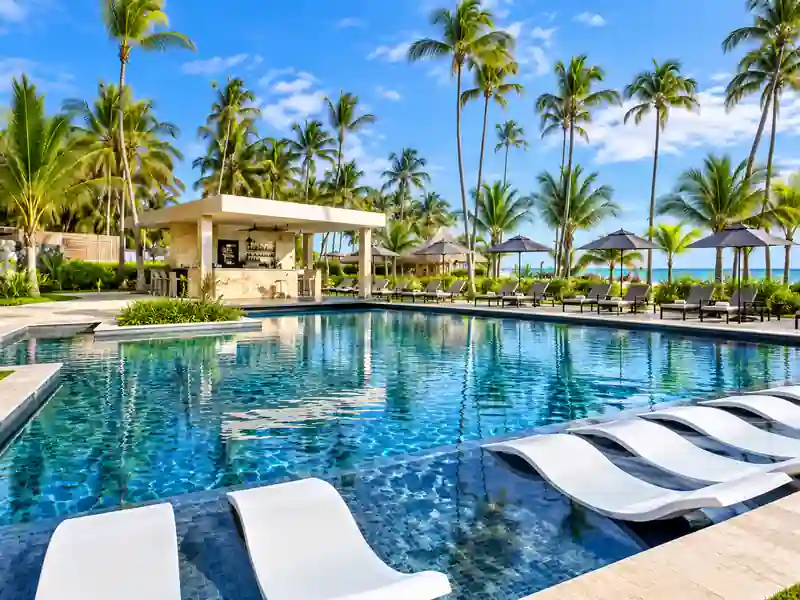Dreams Flora Cabeza de Toro tropical swimming pool with palm trees and Caribbean beachfront