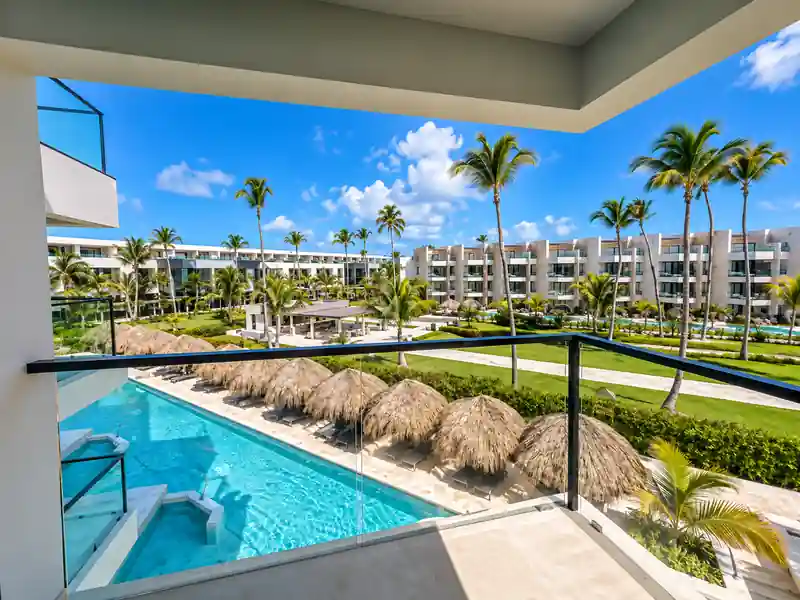 Excellence El Carmen hotel pool and tropical resort view in Punta Cana