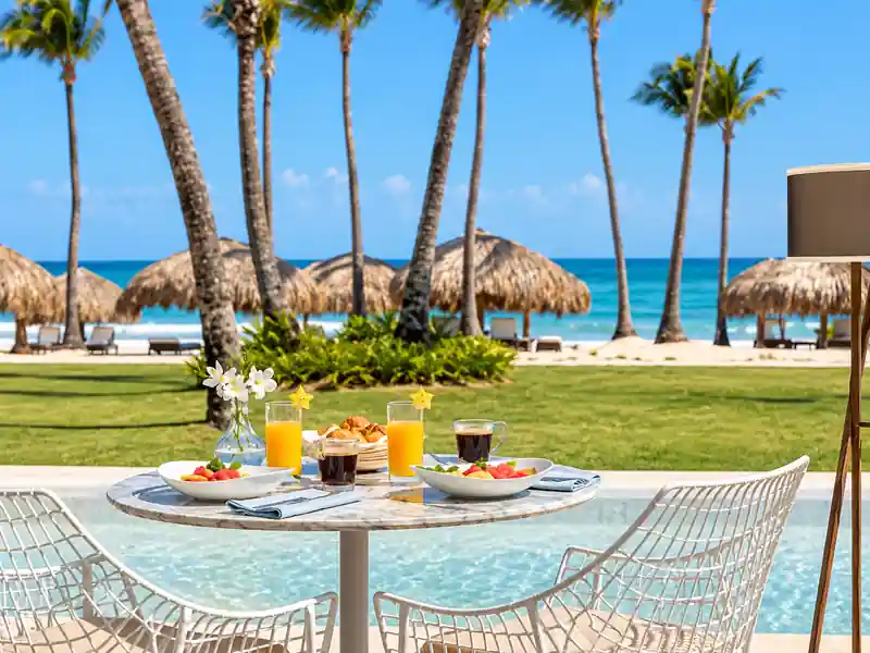 Excellence Punta Cana breakfast table with tropical beach and ocean view