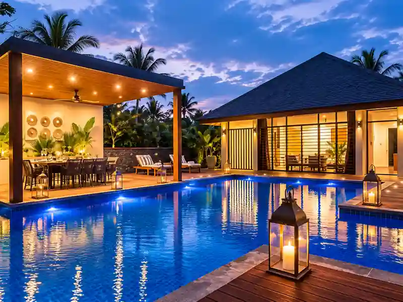 Fishing Lodge Cap Cana private pool villa at sunset with tropical outdoor dining area