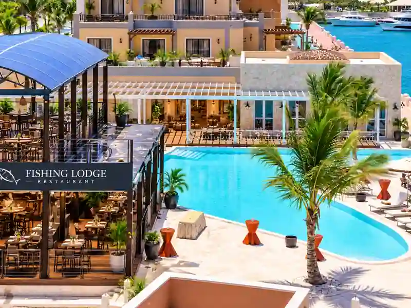 Fishing Lodge Cap Cana restaurant and swimming pool overlooking the marina