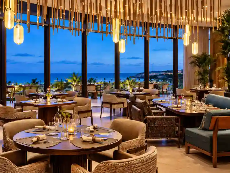 Four Seasons Cap Cana luxury ocean-view restaurant with elegant dining tables and tropical