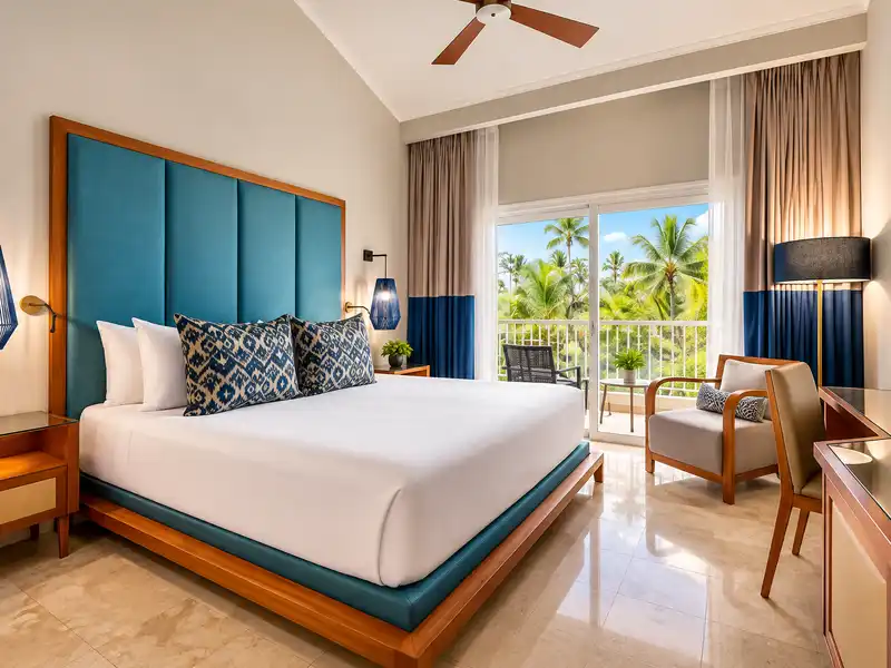Grand Palladium Punta Cana Resort & Spa deluxe room with tropical balcony view